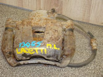 Суппорт передний левый Chevrolet Lacetti J200