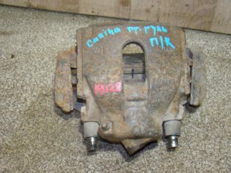 Суппорт передний правый Toyota Carina E T190