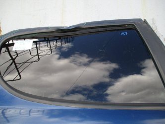 Стекло двери задней правой Peugeot 207