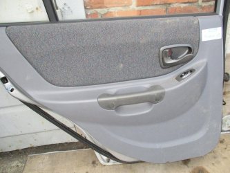 Обшивка двери задней левой Hyundai Accent LC