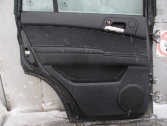 Обшивка двери задней левой SsangYong Kyron DJ