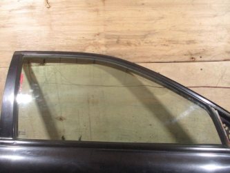 Стекло двери передней правой Kia Spectra SD
